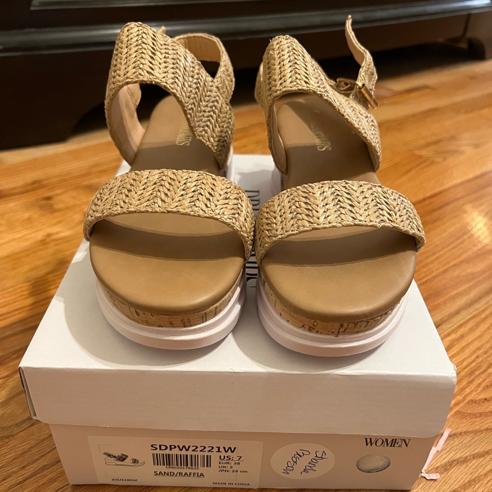 Wedge sandals. Never worn. Size 7.